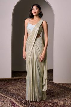 Mint pre-draped saree in flat chiffon lurex base. Comes with a flat silk padded blouse with pearls hand embellishments. - Aza Fashions Elegant Georgette Pre-draped Saree With Zari Work, Elegant Cotton Silk Pre-draped Saree With Dupatta, Elegant Silk Pre-draped Saree For Festive Occasions, Festive Silk Chiffon Pre-draped Saree, Cotton Silk Pre-draped Saree With Mirror Work For Reception, Gold Cotton Silk Pre-draped Saree For Reception, Silk Pre-draped Saree With Dupatta For Party, Fitted Cotton Silk Pre-draped Saree For Wedding, Pre-draped Georgette Saree With Zari Work