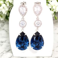 Navy Blue Long Earrings Navy Blue Bridal Earrings Bridesmaid Earrings Navy Blue Bridesmaid Jewelry Navy Sister Wives Jewelry Gift Her  Matching Necklace is available here: https://www.etsy.com/listing/231511007/navy-blue--crystal-pendant * Available in MORE COLORS, please refer to the color chart (last picture). Shimmering in deep blue tones, this stunning  Montana Earrings oozes sophistication!  These dazzling fancy crystals are designed with incredible facets that produce the famous  sparkle. Elegant Blue Bridal Earrings For Bridesmaids, Elegant Blue Teardrop Bridal Earrings, Elegant Blue Wedding Earrings, Blue Bridal Earrings For Formal Occasions, Blue Dangle Earrings For Bridesmaids, Elegant Royal Blue Earrings For Party, Blue Bridal Drop Earrings As A Gift, Blue Jewelry With Matching Earrings For Bridesmaid Gift, Blue Drop Earrings For Formal Bridal Wear