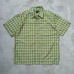 Vintage Lost Skateboards Green Plaid Button Down Shirt Zippered Pockets Good Condition, Some Pilling Throughout. Size L 24x30.5 Shop Policies: No Refunds / Returns / Exchanges / Trades. Vintage And Used Items May Have Wear Including But Not Limited To Yellowing, Staining, Pilling, Holes, Etc. We Will Do Our Best To Disclose But Some Imperfections May Be Missed. Items Typically Shipped Same Or Next Day. Measurements Are Included For Convenience But Are Amateur And May Not Be Exact. Nwt Or Deadsto Casual Shirt With Button Closure For Outdoor, Casual Outdoor Shirt With Buttons, Casual Collared Shirt For Outdoor Activities, Casual Short Sleeve Shirt For Summer Outdoor Activities, Casual Outdoor Shirt With Snap Buttons, Casual Collared Tops For Outdoor Activities, Casual Button-up Short Sleeve Shirt For Outdoor, Casual Short Sleeve Button-up Shirt For Outdoor, Casual Tops With Snap Buttons For Outdoor