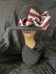 Stand out in this one of a kind Hat Bandit fedora. Designed for the individual who wants to showcase their own unique style, flair and elegance. This classy fedora is accented with a reimagined band created from a wide pinstriped neckties intertwined and sculpted to obtain this unique style. This beauty can be dressed up or down to accommodate any style. Perfect gift for anniversary, birthday, Christmas, Father's Day, Mother's Day or any occasion you want to stand apart from the crowd. Custom Wide Brim Fedora For Formal Occasions, Formal Wide Brim Fedora, Fitted High Crown Hat For Fall, Gray Fitted Wide Brim Fedora, Custom Formal Hat For Kentucky Derby, Custom Hat For Kentucky Derby, Western Style Fedora For Winter Parties, Gray Brimmed Hat For Kentucky Derby, Western Style Winter Fedora For Party