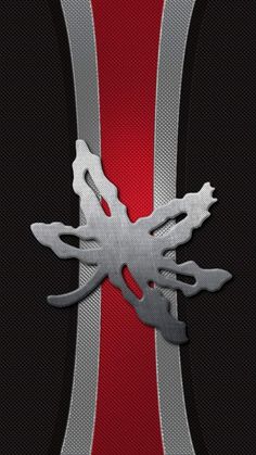 an image of a red and black background with silver accents on it's side