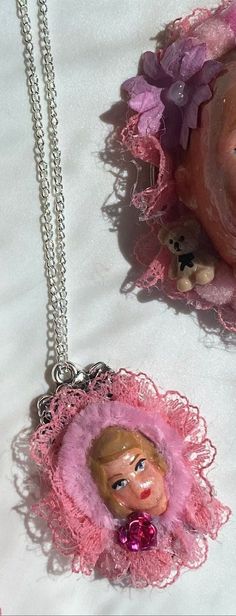 Doll face necklace pretty in pink handmade original wearable art statement jewellery necklace frilly vintage style hand crafted Beautiful handmade doll face necklace. Hand painted and made from start to finish using felt, clay, glaze, paint, findings, cameo setting, fabric and chain. Thank you for your interest in my art Chantelle xoxo Whimsical Pink Pendant Necklace, Vintage Handmade Pink Necklace, Handmade Vintage Pink Necklace, Cute Handmade Pink Necklaces, Handmade Pink Pendant Necklace, Unique Pink Pendant Necklace, Handmade Pink Whimsical Necklace, Handmade Whimsical Pink Necklace, Whimsical Handmade Pink Necklace