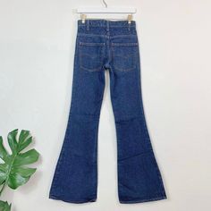 Vintage 70s 684 Orange Tab Dark Wash Levi's//Slim fit/Bellbottom leg. 28" waist, 10" rise, 34" inseam, 33" hips, 31.5" upper hip, 19" thigh, 23.5" leg opening. Will fit a size XXS/23 best imo, maybe a 24 with very slim hips/thighs, but please compare your measurements and ask me questions. Great quality 100% cotton denim and these actually hug your butt! Price firm We ship internationally! SV01888 High Waist Fitted Flares With Five Pockets, Retro Straight Leg Pants For Fall, Retro Straight Leg Fall Bottoms, Retro Straight Leg Bottoms For Fall, Fitted Denim Retro Flares, Fitted Retro Denim Flares, Retro Mid-rise Stretch Flares, Retro High Rise Flares For Fall, Retro High Waist Flare Jeans For Spring