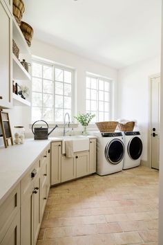 a washer and dryer sitting in a kitchen