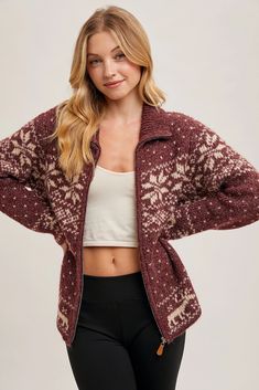 Stay cozy and chic this winter with our Nordic Print Zip Up Sweater in wine. The super soft knit features a playful reindeer and snowflake pattern, and the front zip adds versatility to the slightly oversized fit. Perfect for staying warm and stylish all season long! Model is 5'10" and wearing her true size Small. Small: Bust 22”, Length 26.5” 55% Acrylic, 25% Polyester, 20% Nylon. Nordic Print, Snowflake Pattern, Zip Up Sweater, Denim Jumpsuit, Stay Cozy, Cardigan Tops, Bottom Clothes, Small Bust, Soft Knits