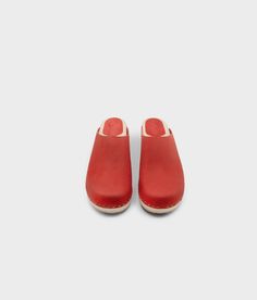 Elevate your everyday style with our minimalist clog mule, featuring clean lines and a timeless aesthetic that effortlessly transitions from day to night. Clog measurements:Heel height: 1 3/4” (4.5 cm)Toe height: 1 5/8″ (4.1 cm) Fit:RegularLeather:Nubuck leather Clogs consist of:Base: European Lime Wood Sole: Rubber sole Fastening: Staples Classic Everyday Slip-on Clogs, Modern Clogs With Rubber Sole And Open Heel, Classic Clogs With Leather Sole For Everyday, Modern Everyday Mules With Rubber Sole, Modern Mules With Rubber Sole For Everyday, Modern Mules With Rubber Sole, Solid Color Slip-on Clogs With Rubber Sole, Modern Open Heel Clogs With Rubber Sole, Classic Mules With Wooden Heel