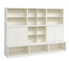 a white bookcase with six doors and two cupboards