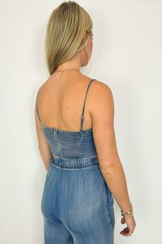 Details: Get ready to rock the latest trend with this Chambray Corset Tank Top! Perfect for adding a touch of edgy style to any outfit, this top features a flattering corset design that will accentuate your curves. Made with lightweight chambray fabric, it's both chic and comfortable. - Corset detail - Sleeveless Content 100% LYOCELL Size + Fit Model is 5'9" and wearing a Small - Measurements from a size Small - Full length: 18"- Chest: 32"-36"- Waist: 28"Brand: The Workshop Studio Trendy Sleeveless Medium Wash Crop Top, Edgy Spring Tops With Built-in Bra, Trendy Medium Wash Sleeveless Crop Top, Trendy Crop Top With Built-in Bra For Day Out, Fitted Denim Tops With Adjustable Straps, Trendy Night Out Top Bra Friendly, Trendy Bra Friendly Tops For Night Out, Chic Denim Crop Top For Night Out, Trendy Bra-friendly Top For Night Out