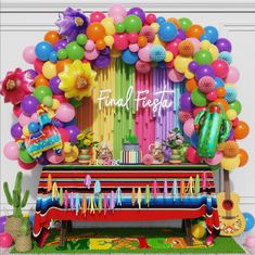 a colorful birthday party with balloons, streamers and decorations on the front door wall