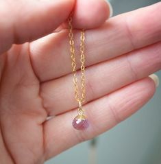 If you're looking for a dainty, sparkly necklace with powerful properties, this tiny pale Amethyst drop necklace is for you! Crafted with 14k gold filled, this delicate beauty will add a subtle pop of color and good vibes to your day. Amethyst is believed to bring its bearer protection and healing, while enhancing passion, creativity, and spirituality. It's also said to assist with temperance and sobriety, as well as inflammation.This necklace is handcrafted with a small pale purple Amethyst fac Dainty Briolette Crystal Necklaces As Gifts, Delicate 14k Gold Filled Drop Necklace For Gift, Dainty Gold Birthstone Necklace With Faceted Details, Dainty 14k Gold Filled Faceted Necklace, Dainty Faceted 14k Gold Filled Necklaces, Dainty 14k Gold-filled Faceted Necklace, Dainty 14k Gold Filled Drop Necklace As Gift, Lavender Dainty Birthstone Jewelry, Dainty Lavender Birthstone Jewelry