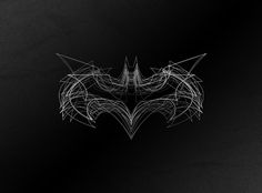 the dark knight rises logo on a black background with white lines in the shape of batman's head