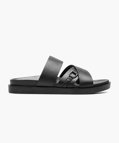 The Stacy Adams Modesto Cross Strap Ornament Slide Sandal has a sleek clean look that is highlighted by an ornament on the front strap that gives it just the right amount of understated design detail. Versatile enough to dress up or down, tis is one sandal that can be worn with everything from chinos to shorts. Durable man-made upper Unlined shoe Fully cushioned insole with EVA for added comfort Durable man-made outsole Black T-strap Synthetic Sandals, Black Synthetic T-strap Sandals With Cushioned Footbed, Luxury Black T-strap Sandals With Removable Insole, Black T-strap Flip Flops With Removable Insole, Black Synthetic T-strap Sandals With Buckle Closure, Cross Straps, Slide Sandals, Black Shoes, Design Details