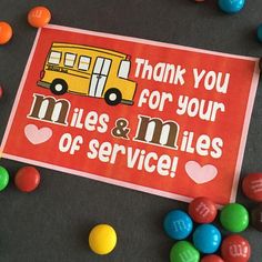 a thank you for your miles and miles of service card surrounded by m & m candies