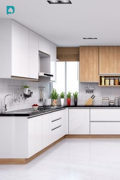 a modern kitchen with white cabinets and black counter tops is seen in this image from the front view