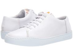 Camper Peu Touring - K100479 - Men's Shoes : White : Discover new style possibilities with the Camper Peu Touring - K100479 sneakers constructed of a leather or suede upper with contrast laces and an EVA outsole. 360° stitching for greater durability. Recycled textile and synthetic linings. Imported. Measurements: Weight: 10 oz Product measurements were taken using size 44 (US Men's 11), width D - Medium. Please note that measurements may vary by size. Weight of footwear is based on a single ite Casual Low-top Walking Shoes With Laces, Leather Low-top Lace-up Shoes With Elastic Laces, Leather Lace-up High-top Sneakers For Sports, Sporty Lace-up Sneakers With Rubber Sole, Modern Lace-up Walking Shoes For Streetwear, Modern High-top Sneakers With Textured Sole For Spring, Urban Lace-up Walking Shoes With Rubber Sole, Athleisure Slip-on Sneakers With Contrast Sole, Modern Sneakers With Contrast Sole For Spring