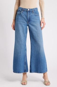 Sport a vintage-chic vibe in these faded nonstretch-denim jeans made with a high waist and full-length wide legs that have a slight flare. 27 1/2" inseam; 29" leg opening; 11 1/2" front rise; 14" back rise (size 29P) Zip fly with button closure Five-pocket style 100% recycled cotton Machine wash, dry flat Imported Fall Medium Wash Wide Leg Flares, Chic Faded Flare Jeans For Spring, Chic Medium Wash Straight Leg Flares, Chic Medium Wash Full Length Flares, Faded Cropped Leg Flare Jeans For Fall, Denim Blue Wide Leg Flares For Fall, Wide Leg Denim Blue Flares For Fall, Fall Denim Blue Wide Leg Flares, Chic Mid-rise Faded Flare Jeans