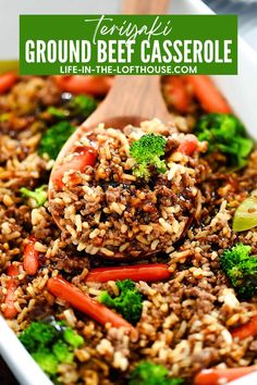 ground beef casserole with broccoli and carrots in a white dish