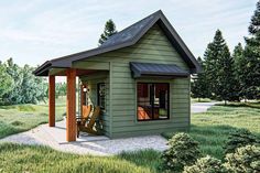 a small green house with a porch and covered patio