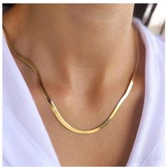 Elegant Gold Snake Chain Necklace, Herringbone Chain Necklace, Flat Snake Chain Choker, 14k Gold Plated, 925 Sterling Silver Discover the epitome of sophistication with our premium 925 Sterling Silver Necklace. Designed for the modern woman, our flat snake bone chain necklace exudes a luxurious aura that’s both timeless and contemporary. Embrace the essence of fashion with a piece that's in vogue, making a subtle yet bold statement. Key Features: Luxurious 925 Sterling Silver: Crafted with high- Snake Chain Gold, Gold Herringbone Chain, Flat Snake Chain, Herringbone Chain Necklace, Gold Snake Chain, Herringbone Chain, Herringbone Necklace, Snake Chain Necklace, Gold Rope Chains