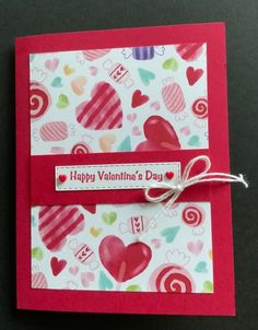 a valentine's day card with hearts and candy