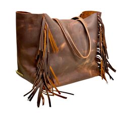 Travel Bags With Fringe And Double Handle, Leather Travel Satchel With Fringe, Travel Fringe Tote Satchel, Travel Tote Satchel With Fringe, Leather Satchel With Fringe For Travel, Leather Bags With Fringe For Everyday Use, Shopping Tote Bag With Fringe, Fringe Tote Satchel For Travel, Leather Fringe Bags For Everyday Use