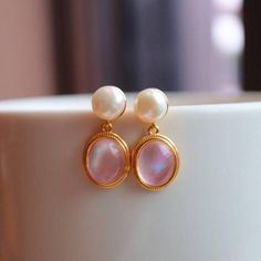 Pink Natural Crystal Mother of Pearls Earrings Gold Vermeil #pearls #luxuryjewelry #pearlstyle #pearlearrings #pearlshell #vintagejewelrylovers #baroquepearls #leatherandpearls #pearlstrand #pearlstuds Exquisite Gold Clip-on Earrings, Pink Clip-on Earrings For Anniversary, Pink Clip-on Jewelry For Anniversary, Formal Pink Round Clip-on Earrings, Rose Gold Plated Pearl Earrings As Gift, Rose Gold Plated Pearl Earrings For Gift, Elegant Pink Teardrop Pearl Earrings, Fine Jewelry Gold Plated Earrings As Gift For Her, Pink Teardrop Pearl Earrings For Formal Occasions