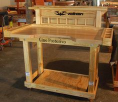 a wooden table sitting inside of a store