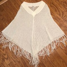 Lightweight Knit Poncho With Fringe From One Step Up. Received As A Gift. Never Worn. 55% Ramie 30% Acrylic 15% Mohair Casual White Knit Poncho, Oversized Open Knit Casual Poncho, Cozy One Size Poncho For Beach, Beige Knit Poncho One Size, One-size Beige Knit Poncho, Beige Knit Poncho, Casual Knitted Poncho For Spring, Casual Knitted Spring Poncho, Casual Open Knit Poncho One Size