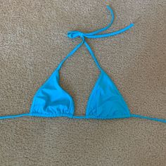 Never Worn. Brand New Blue Bikini Top. No Padding. Size Small Fitted Triangle Top Swimwear For Pool, Light Blue Triangle Top Swimwear For Vacation, Turquoise Triangle Top Swimwear For Summer, Light Blue Triangle Top Swimwear For Beach, Light Blue Triangle Top Swimwear For Beach Season, Beachy Triangle Top Turquoise Swimwear, Turquoise Triangle Top Beachwear, Blue Triangle Top Swimwear For Vacation, Light Blue Stretch Swimwear For Vacation