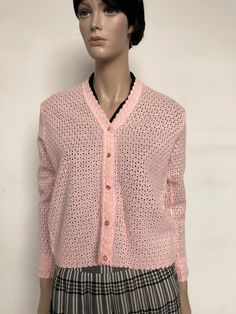 "Cute lace effect knitted cardigan in marshmallow pink - Classic 1960s - 5 button front Label: St. Michael Size: Original label states bust 36\". Measurements approximately UK10/12 but dependent on desired fit as with all knitwear there is some flexibility. For reference mannequin pictured is size 10. Bust 36\"/ 91cm Length centre back 22\"/ 56cm Condition: Good Condition no marks or damage  Postage: Royal Mail 2nd Class signed/ International tracked. Any other questions please ask!" Pink Button-up Cardigan For Spring, Elegant Pink Sweater With Button Closure, Elegant Pink Cardigan With Button Closure, Feminine Fitted Cardigan For Daywear, Fitted Pink Pointelle Knit Sweater, Pink Fitted Pointelle Knit Sweater, Classic Fitted Pink Cardigan, Fitted Classic Pink Cardigan, Vintage Long Sleeve Open Knit Tops