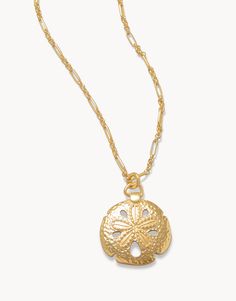 Whether a magic coin dropped by a mermaid or an Easter lily, our long Sand Dollar Necklace will charm any beach lover. Keep the ocean close with this 18 KT matte gold plated necklace. Magic Coins, Lowcountry Style, Sand Dollar Necklace, Easter Lily, Spartina 449, Beach Lover, Sand Dollar, Accessories Jewelry Necklace, A Mermaid