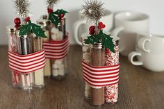 a cell phone with an image of christmas decorations in jars and the caption hot chocolate kits