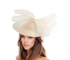 White Bow Saucer Disc Kentucky Derby Fascinator Hat Royal Ascot Wedding Hatinator Cocktail Formal Womens Races Party Hats Custom Headpiece Hats By Cressida Kentucky Derby & Ascot Fascinator Hats White Kelaa Feather Free Fascinator Pretty white saucer sinamay base trimmed with white elegant bow Base measures about 12 inches wide This white headpiece is mounted with a matching headband. If you prefer a headband to match your hair, please make a note at check out what colour headband you want. Elev Elegant Wedding Hat With Bow, Elegant Cream Hat With Bow, Elegant Mini Hat With Bow For Kentucky Derby, Chic Party Hat With Bow, Wedding Hats With Bow For Royal Ascot, Wedding Hats With Bow And Short Brim, Wide Brim Party Hat With Bow, Party Fascinator With Bow And Curved Brim, Party Fascinator With Curved Brim And Bow