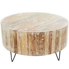 a round wooden table with metal legs on an isolated white background for use as a coffee table