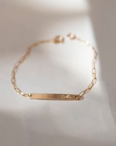 Personalized this bracelet with any special date, name or word. On a dainty paperclip chain this bracelet is THE perfect meaningful gift for that special someone. * 14k gold fill or sterling silver * Bar measures 3x30mm * leave us your personalization request while check out Bar Bracelet Personalized, Bar Bracelet, Meaningful Jewelry, Silver Bar, Roman Numeral, Bar Bracelets, Trombone, Silver Bars, Colorful Bracelets