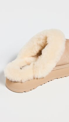 Cannot be shipped outside the USADyed shearling, from AustraliaUpper: Cowhide suedeShearling trim and footbedRound toeEVA soleImported, VietnamThis item cannot be gift-boxedStyle #UGGGG30290 Uggs Slippers, Cute Converse Shoes, Cute Converse, Thanksgiving 2024, Soft Gloves, Hoka Shoes, Please And Thank You, Ugg Slippers