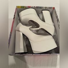 Never Worn Shoes In Original Box. White Patent Leather Heels With 4-inch Heel, White Square Toe Heels With 4-inch Heel, White Chunky Platform Heels With Round Toe, White Heels With Chunky Platform And Round Toe, White Patent Leather Block Heels, Cream Patent Leather Platform Heels, White Patent Leather Closed Toe Heels, White Closed Toe Patent Leather Heels, White Patent Leather Heels With Almond Toe