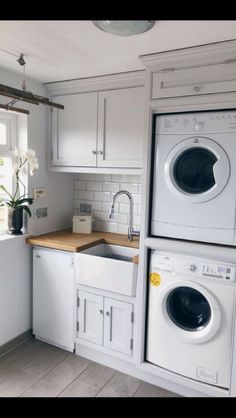 a washer and dryer in a small kitchen