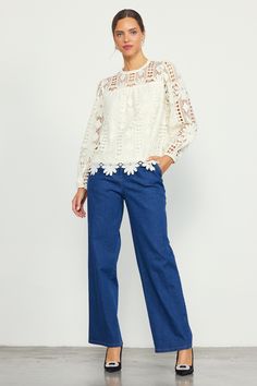 Crafted from embroidered open-eyelet lace, this long-sleeve blouse has lots of textural richness. It's got a floral motif woven in, creating a standout scalloped hem. The airy top features a round neckline and a back keyhole that's fastened by a loop button at the interior. •Round neckline •Long sleeves •Partially lined •Back keyhole with button •Relaxed fit Item Number: 45924 100% POLYESTER Long Sleeve Broderie Anglaise Top For Work, Casual Long Sleeve Lace Top With Lace Collar, Long Sleeve Lace Top For Spring, Chic Scalloped Lace Fall Blouse, Chic Long Sleeve Embroidered Top For Fall, Chic Scalloped Lace Top For Spring, Spring Cotton Lace Top With Lace Trim, Spring Long Sleeve Top With Lace Trim, Long Sleeve Broderie Anglaise Blouse For Fall