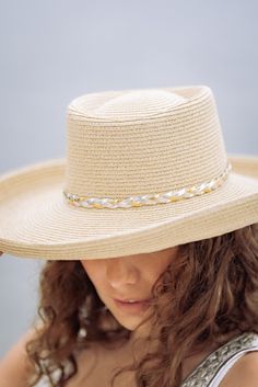 You'll have the perfect accessory for sunny days with the Sailor - Turned Brim Gambler. This lightweight hat is made of 80% paper and 20% polyester for a comfortable fit, with an adjustable band so you can find your perfect size. Plus, the brim size of 4" and UPF 50+ sun protection offers superior protection from the sun. Make a statement with the Silver tone and ultra braid turned brim gambler with mixed metallic braided PU band. Spring Coastal Boater Hat Made Of Toquilla Straw, Adjustable Sun Hat For Vacation, Adjustable Wide Brim Panama Hat With Uv Protection, Lightweight Coastal Straw Hat For Summer, Summer Sun Hat With Uv Protection And Adjustable Fit, Adjustable Fit Summer Sun Hat With Uv Protection, Casual Panama Hat For Beach With Adjustable Fit, Lightweight Flat Brim Hat For Warm Weather, Spring Adjustable Fit Flat Brim Hat