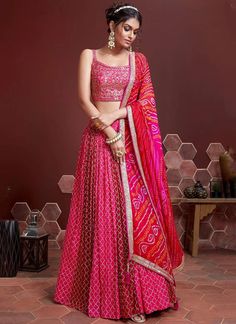 Indulge in luxury with our Excellent Pink Embroidered Chinon Silk Lehenga Choli! Made with high-quality silk, this readymade lehenga is perfect for Indian festivities, weddings, or bridesmaids. The intricate embroidery adds a touch of elegance, making you the center of attention. Elevate your outfit game now! The unstitched blouse can be customized upto 46 inches. Do Note: All the accessories shown are for styling purpose only. Slight color variation may occur due to photographic reasons. Occasi Bridesmaids Lehenga, Lehenga Indian, Lehenga Choli Designs, Lehenga Choli For Women, Bridesmaid Lehenga, Silk Lehenga Choli, Choli For Women, Lehenga Choli Online, Indian Wedding Wear