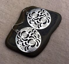 "These are so unbelievably beautiful and stylish! Big silver boho floral disc earrings. They have incredible detail and design. The perfect everyday statement earrings. These are simply gorgeous earrings. Made from allergy free plated silver. The earrings measure 1 5/8\" long by 1 5/8\" long. They hang from simple silver ear wire hooks. Overall drop length is 1 3/4\". I have a matching necklace in my shop if you would like the whole set. Here is a direct link https://etsy.me/3d1P92f Thanks for s Bohemian Silver Flower Shaped Earrings, Bohemian Silver Flower-shaped Earrings, Bohemian Silver Flower Earrings, Silver Bohemian Flower-shaped Earrings, Silver Bohemian Flower Earrings, Bohemian Sterling Silver Flower Earrings For Gift, Bohemian Sterling Silver Flower Earrings With Ear Wire, Bohemian Sterling Silver Pierced Flower Earrings, Bohemian Flower Earrings Nickel Free