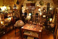 a room filled with lots of antique items