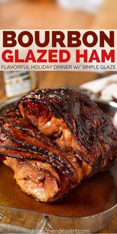 bourbon glazed ham on a plate with the words bourbon glazed ham in front of it