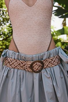 Forever cool and classic, this timeless waist belt is featured in a staple woven fabrication with head-turning circular buckle at center for an added special touch. | Ocean Side Waist Belt by Free People in Tan, Size: S/M Waist Belt, Turning, Free People, Siding, Buckle, Turn Ons, Fabric