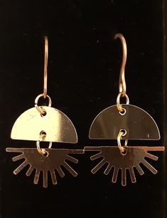 FREE SHIPPING in the USA.  Sold by a USA seller from their home studio in Central Florida. These very elegant and minimalistic earrings are made from delicate surgical grade stainless steel.  Easy to put on, lightweight and comfortable to wear with no irritation.  Stainless steel does not tarnish, stain, fade, rust, corrode and does not turn your skin green.  Great for sensitive ears.  Stainless steel requires little to no maintenance and will stay shiny for a long time. You can use these for an Modern Copper Jewelry For Pierced Ears, Minimalist Round Metal Earrings, Hypoallergenic Rose Gold Brass Earrings, Modern Rose Gold Threader Earrings, Modern Handmade Copper Earrings, Everyday Rose Gold Brass Earrings, Minimalist Adjustable Pierced Earrings, Nickel Free Minimalist Rose Gold Earrings, Nickel-free Minimalist Rose Gold Earrings