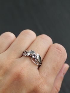 ITEM DESCRIPTION:The size  of the ring on photo 4 1/4 (US and Canada) I (UK and AU) I can make it any size you want - just mark your size in the orderWeight - 3 g. Absolutely unique and amazing botanical ring with leaves and twigs. I made it of sterling silver, blue topaz, and peridot. But I can make it with different gemstones - write to me and will discuss your custom order. I usually respond to letters very quickly.This Elven ring will be a great addition to your jewelry collection or a speci Delicate Silver Stackable Rings With Rose Cut Diamonds, Unique Silver Promise Ring, Delicate Silver Ring With Rose Cut Diamonds, Stamped 925 Open Flower Ring For Wedding, Unique Open Stackable Wedding Rings, Nature-inspired Silver Promise Ring, Silver Nature-inspired Stackable Rings For Promise, Silver Stackable Promise Rings With Nature-inspired Style, Silver Nature-inspired Stackable Rings For Anniversary