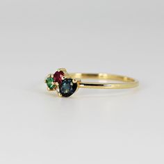 This beautiful cluster ring was made of 14k gold band, 14k gold prong settings. It's perfect as engagement ring or statement piece. DETAILS ABOUT THE RING, MATERIAL AND STONES * 14k 1.2 mm solid gold band and prongs. * 5x3 mm oval shape sapphire * 2.5 mm round emerald and ruby * 1.5mm diamond, 0.015ct * Birthstones : September, May, July and April We can make this design with any of gemstones. Please contact us. This ring was hand crafted in Melt'm Jewelry Studio in California. Thanks for visiti 14k Gold Cluster Ring With Round Cut For Promise, 14k Gold Round Cut Promise Cluster Ring, 14k Gold Birthstone Cluster Ring, Promise Diamond Cluster Ring In 14k Gold, 14k Gold Cluster Diamond Promise Ring, Yellow Gold Multi-stone Sapphire Promise Ring, Fine Jewelry 14k Gold Cluster Promise Ring, Fine Jewelry 14k Gold Cluster Ring For Promise, 14k Gold Cluster Ring For Promise Occasions