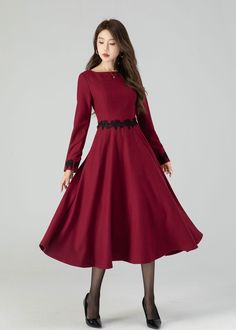 Discover modern elegance in our burgundy long-sleeved wool midi dress, thoughtfully designed with lace details at the waist and cuffs. The burgundy shade effortlessly stands out, and the premium wool fabric ensures both coziness and luxury. The intricate lace elements offer a unique and graceful touch. Whether you're exploring the city or enjoying a cozy evening, this midi dress is a chic and practical option for staying fashion-forward and snug. Details: * 35% wool blend, 35% fiber and polyester, 30% nylon * Polyester lining * Two side pockets * Right zipper dress * Long sleeves dress * Lace dress * Autumn winter dress * Dry clean MODEL SIZE Bust 85 cm(33.4") Waist 67 cm(26.7") Height 168cm (5' 6") She wears size XS CUSTOM MADE SERVICE If you  * Need a tailored clothes with your body meas Elegant Winter Dresses With Lace Trim, Formal Long Sleeve Midi Dress With Lace Trim, Formal Long Sleeve Wool Dress, Elegant Fall Midi Dress With Lace Trim, Formal Long Sleeve Wool Midi Dress, Wool Midi Dress With Long Sleeves For Fall, Wool Long Sleeve Midi Dress For Fall, Wool Party Dress For Fall, Fall A-line Dress With Lace Trim