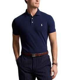 From Polo Ralph Lauren&#x2C; this polo shirt features:Classic fitRibbed polo collarShort sleeves with ribbed armbands3-button placket with genuine mother-of-pearl buttonsSignature embroidered pony on the left side of the chestEven vented hemStretch fabricShell of cotton/elastaneRibbed trim of cottonMachine wash/tumble dryImported. Classic Fitted T-shirt With Ribbed Collar, Fitted Short Sleeve Polo Shirt With Ribbed Collar, Classic Fitted Collared T-shirt, Classic Fitted Polo Shirt For Workwear, Business Casual Short Sleeve Top With Ribbed Collar, Short Sleeve Tops With Ribbed Collar For Business Casual, Fitted Polo Collar Business Casual Shirt, Fitted Polo Collar Shirt For Business Casual, Fitted Polo Shirt For Business Casual